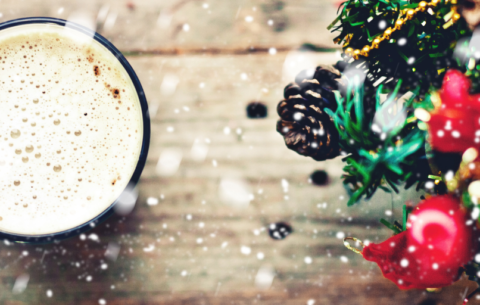 Christmas decorations and mug of coffee